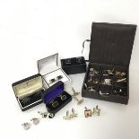 A collection of sleevelinks including two marked 925, also several novelty cufflinks including