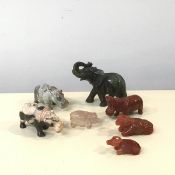 A collection of carved hardstone animals, including an elephant (h.9cm x 12cm x 5cm), three