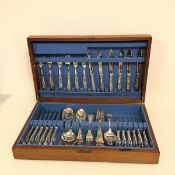 A Walker & Hall canteen of cutlery, the mahogany case with rosewood veneer to hinged top, with