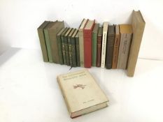 An assortment of books including The Works of Edmund Burke in six volumes, Moliere, Comedies, in two