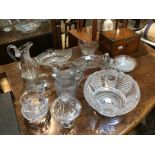 A group of Regency and later cut-glass including four water jugs of various shapes (two with