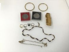 A mixed lot of jewellery including an assorted bead, including tiger's eye, necklace, two gilt metal