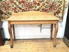 An Edinburgh consul table, c.1840, the arched galleried back above a rectangular top with rounded