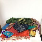 A large collection of sarees in various patterns and textures (12)