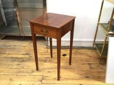 An Edwardian mahogany side table, the square top with moulded edge above a single frieze drawer,