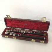 A Boosey & Hawkes flute, stamped London 24798LFC, in a Rudall Carte hard case (67cm)