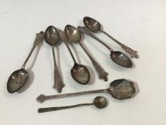 A set of six Birmingham silver engraved teaspoons, a Sheffield silver jam spoon and a chased mustard