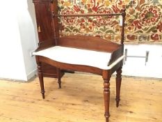 A Victorian mahogany wash stand with turned towel rail and gallery, marble serpentine top on