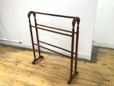 An Edwardian towel rail of traditional form, repair to one shoulder (87cm x 77cm x 26cm)