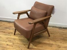 A John Lewis oak low back easy chair with upholstered tan leather back and tan leather squab cushion