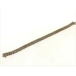 A 14ct gold articulated tennis style bracelet, set fifty four diamonds (approx 0.1ct each) (16g) (