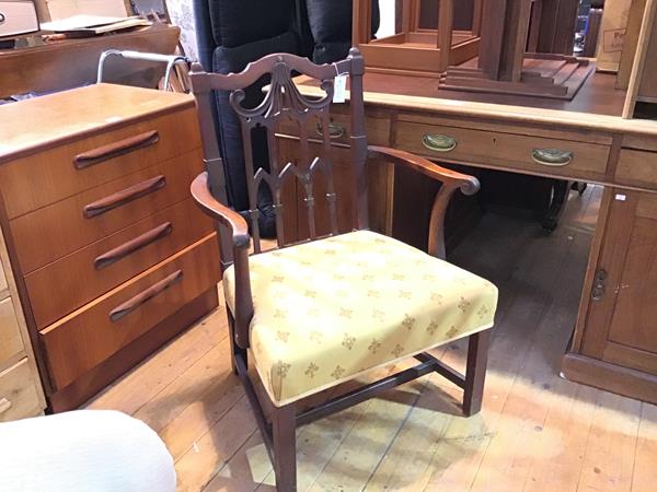 A 19thc mahogany Chippendale inspired open arm carver chair with arched top and pierced pagoda style