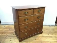 An early 20thc. chest of drawers, fitted two short and three graduated drawers, on bracket feet (