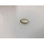 An 18ct gold five stone diamond ring (O) (3.82g)