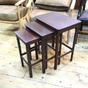 A set of three nesting tables, the smallest with square top (largest: 57cm x 46cm x 33cm)