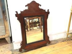 A 19thc fretwork mirror, with scroll top and ebonised fluted slip (57cm x 40cm)