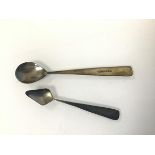 An Edinburgh silver spoon, dated 2000, makers mark, PJM (13cm) and another with a spade shaped bowl,