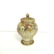 A blush ivory Royal Worcester pot pourri vase, of urn form with pierced lid, shape no.1720 (h.20cm x