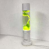 A Mathmos lava lamp with white fittings and green 'lava' (40cm x 11cm)