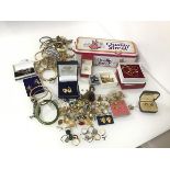 A large assortment of costume jewellery including rings, earrings, bangles, bracelets, pins etc. (