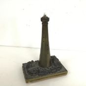 A brass and bronze table lamp in the form of a Lighthouse, adapted to battery power (22cm x 16cm x