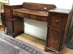 A 19thc mahogany twin pedestal ledgeback sideboard, with bow fronted section fitted three drawers