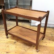 A 1960s/70s teak two tier trolley on square supports, complete with castors (68cm x 80cm x 41cm)