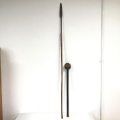 A Zulu war club (63cm x d.8cm) and a spear with metal head and wooden shaft (136cm) (2)