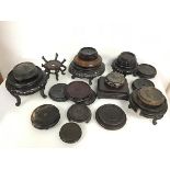 A large assortment of Chinese and Japanese wooden stands, of various shapes, sizes and designs (