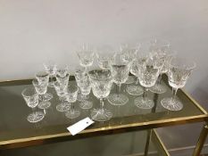 A set of ten Waterford cut crystal white wine glasses, and eleven liqueur glasses (wine glass: