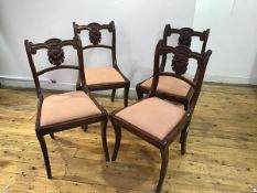 A set of four Scottish Regency dining chairs, in Grecian style, each having moulded and scrolled