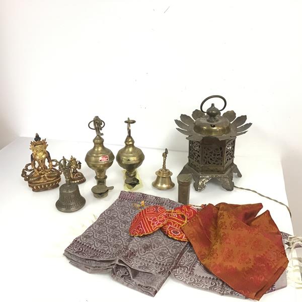 A mixed lot including a near pair of Pooja Brand oil lamps, a brass table lamp in the form of a