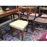 A Victorian rosewood side chair with stuffover seat, on fluted tapered supports (85cm x 44cm)