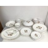 A Wedgwood Susie Cooper dinner service including six dinner plates (d.27cm), six soup bowls (one a/