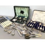 A collection of Epns flatware including sugar tongs, coffee spoons, jam spoons with mother of