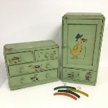 A group of 1930s/40s children's play furniture including a chest of drawers and a wardrobe, all