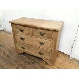 An Edwardian ash chest, the rectangular top with moulded edge above two short and two long