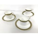 A set of three Royal Doulton teacups and saucers, in Belvedere pattern (teacup: 7cm x 11cm x 8cm)