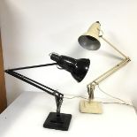 A pair of anglepoise two tier table lamps, both stamped Herbert Terry to stem, one in black, the