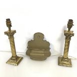A pair of Corinthian column brass table lamps (h.31cm x 9cm) together with a brass wall pocket (3)