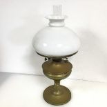 A brass paraffin lamp, the internal clear glass shade marked Sun Brand with further opaque glass