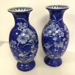 A pair of large Japanese blue and white porcelain vases, possibly Seto, c.1900, of baluster form,