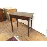 An Edwardian stained side table, the rectangular top with rounded angles and single frieze drawer,