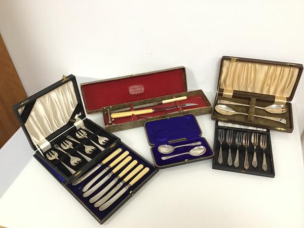 A collection of boxed Epns cutlery, including a Viceroy plate carving set, serving spoons, pastry