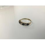 A 9ct gold four stone sapphire half eternity style ring (2.06g) (N)