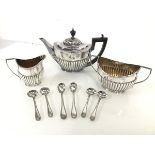 A Goldsmiths Epns tea service, including teapot with urn finial and half lobed body (16cm x 24cm x