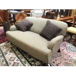 A stylish modern John Lewis two seater sofa upholstered in Harris Tweed style fabric, with leather