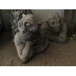 A pair of grotesque garden busts (43cm x 52cm x 29cm)