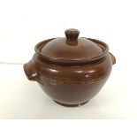 A Pearsons of Chesterfield lidded pot, the body with handles to sides, with allover chocolate