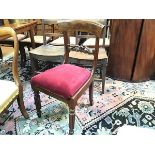 A William IV mahogany side chair with curved top rail and slip in seat, raised on tapered fluted